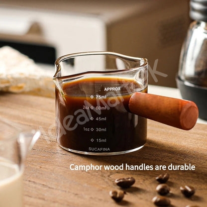 double-nozzle-glass-measuring-cup-with-wooden-handle-dual-scale-product-image