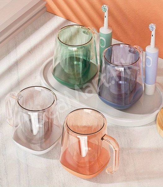 transparent-mouthwash-mug-plastic-tumbler-with-handle-modern-design-for-bathroom-storage-oral-care-product-image
